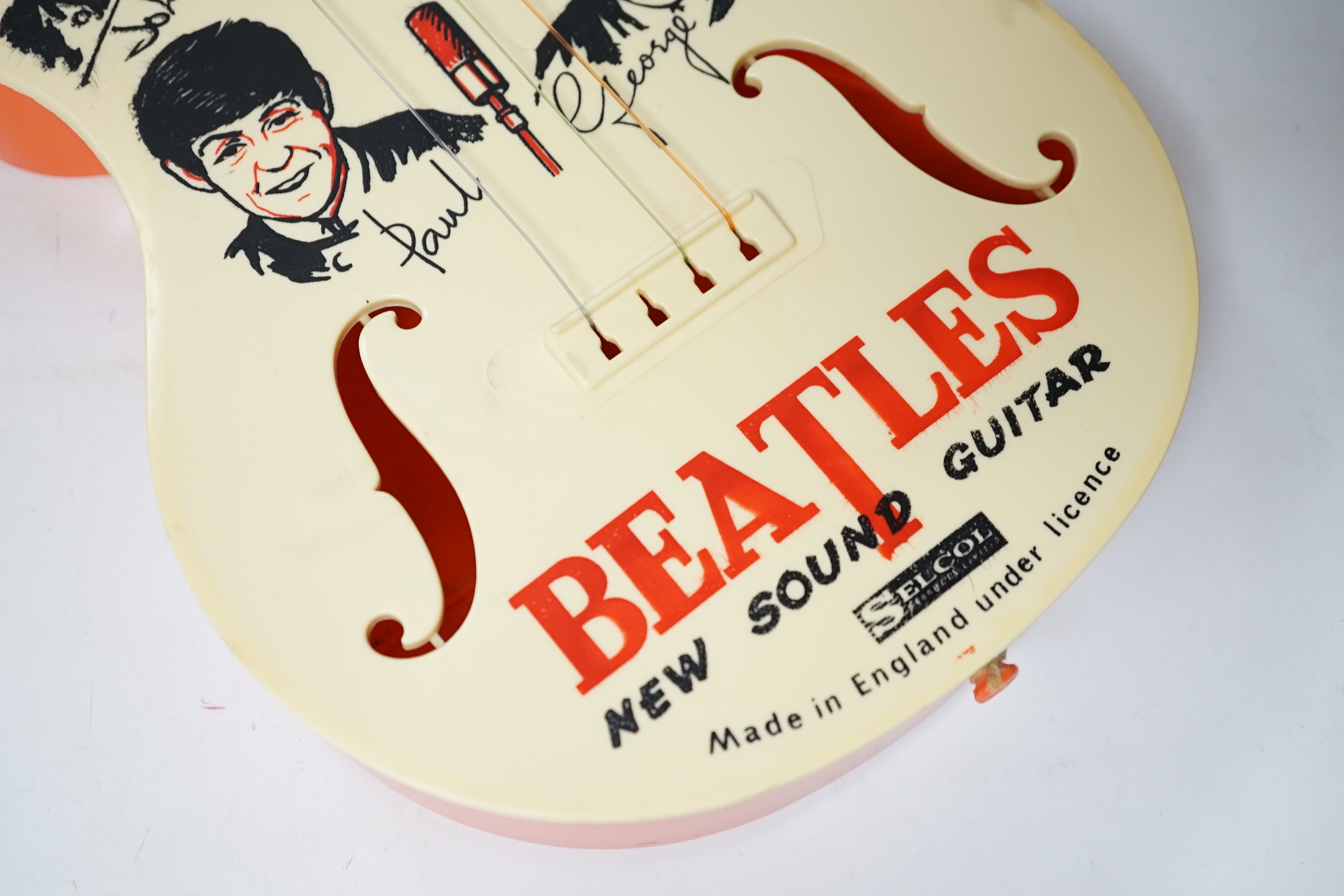 The Beatles plastic toy guitar by Selcol, 59cm